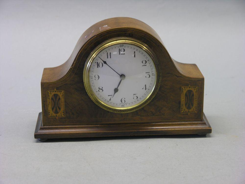 Appraisal: An inlaid burr walnut mantel clock with convex enamelled dial