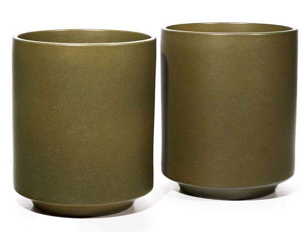 Appraisal: A PAIR LARGE MODERN POTTERY JARDINIERES Green glaze on buff-colored