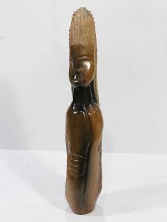 Appraisal: Shona Zimbabwe serpentine sculpture surmounted by a carved bust accented