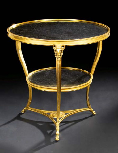 Appraisal: Empire-Style Gilt-Bronze and Marble-Top Occasional Table the circular charcoal marble