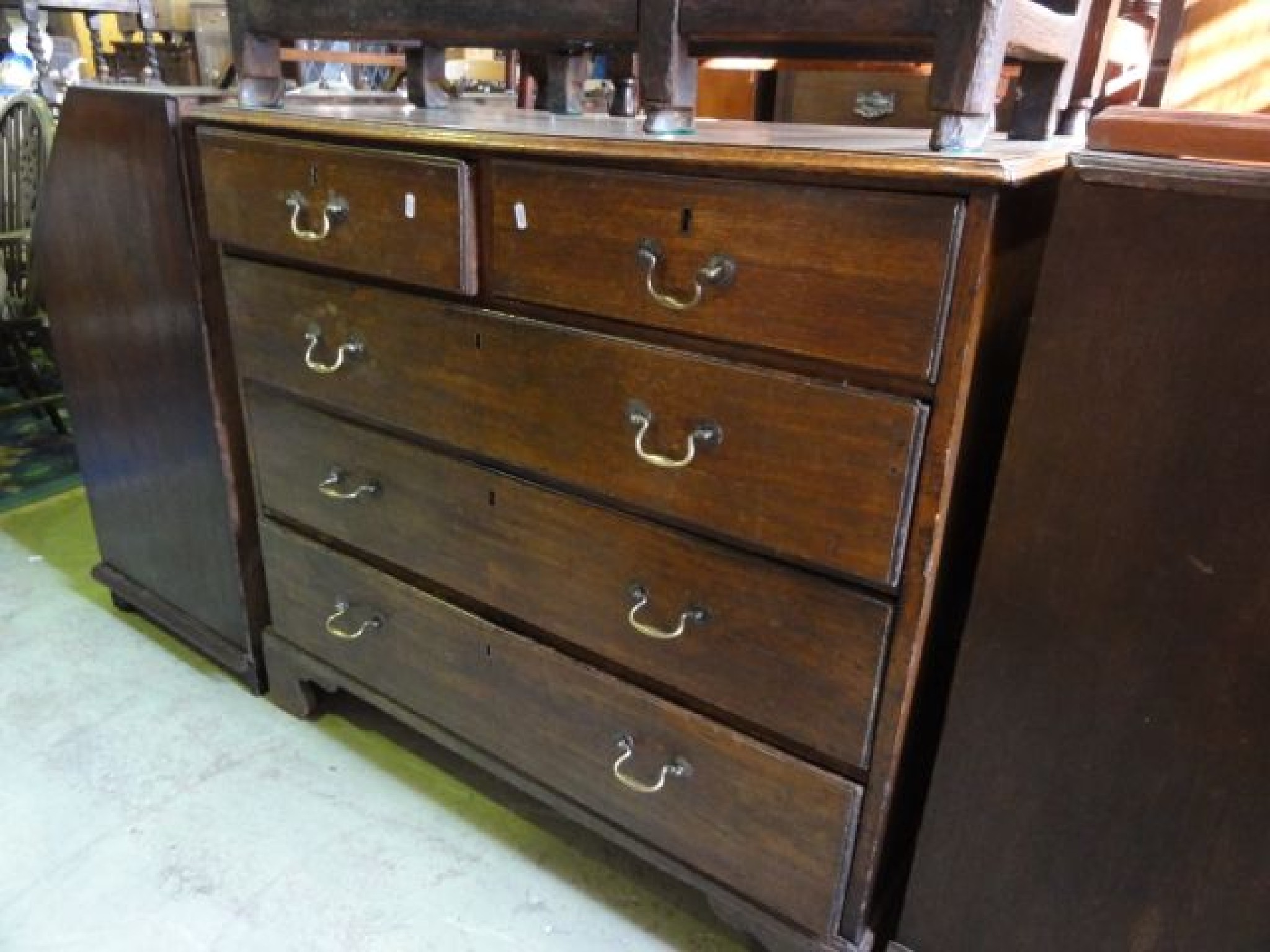 Appraisal: A Georgian oak bedroom chest of three long and two