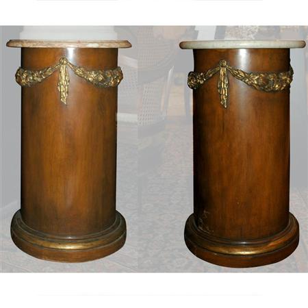 Appraisal: Pair of Louis XVI Style Gilt-Metal Mounted Mahogany Pedestals Estimate