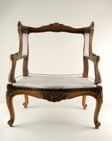 Appraisal: A Louis XV Walnut Child's Wingback Settee having a floral