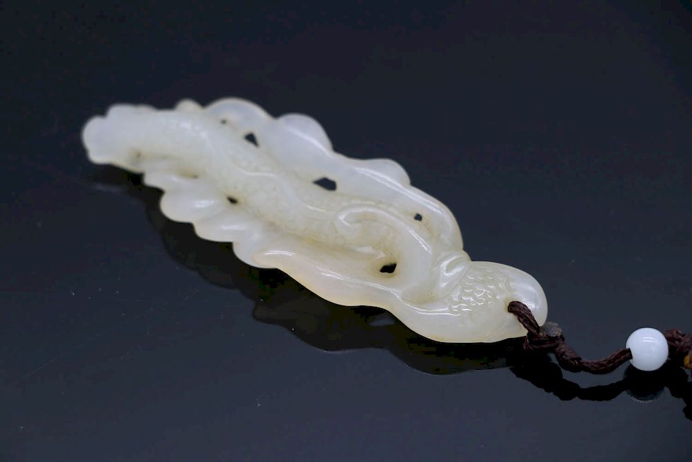 Appraisal: CELADON MONEY PATTERN JADE PENDANT QING The stone of pale