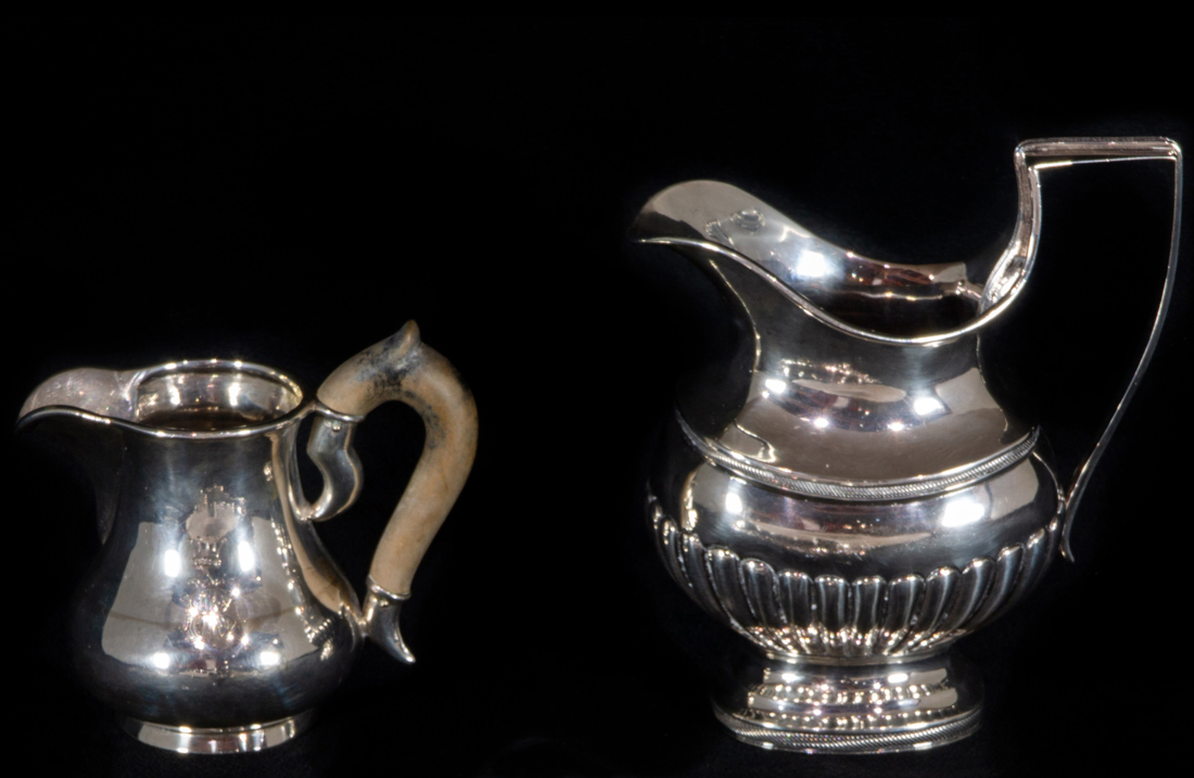 Appraisal: TWO EUROPEAN SILVER CREAMERS Two European silver creamers the larger