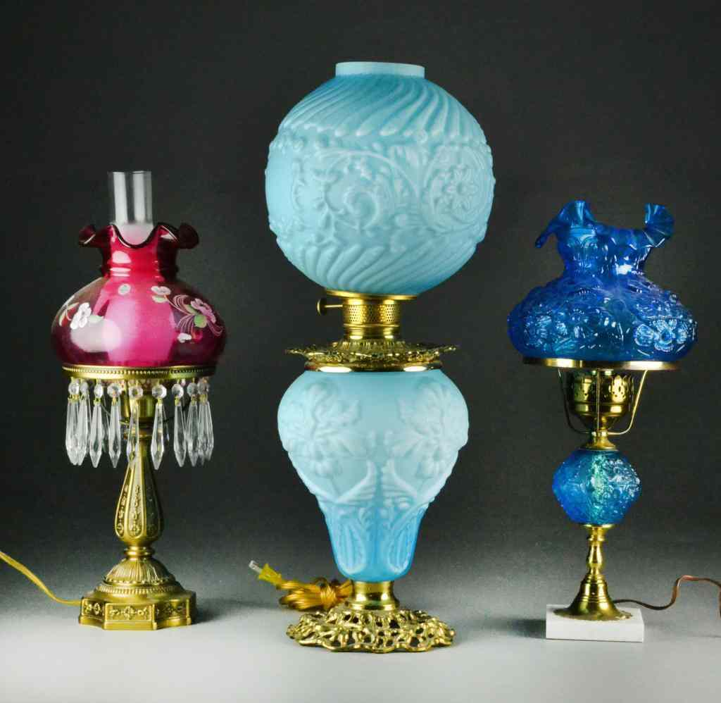 Appraisal: Victorian LampsTo include lamp with blue etched globe aqua glass