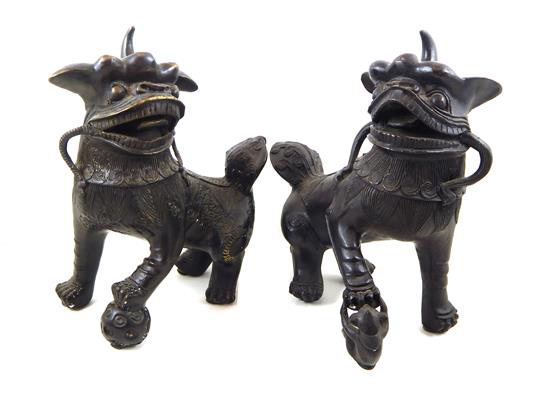 Appraisal: ASIAN Pair of Chinese bronze Foo Dogs th C both