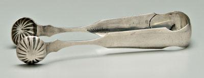 Appraisal: North Carolina coin silver tongs fiddle handles starburst round terminals