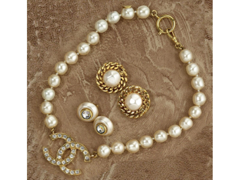 Appraisal: CHANEL SET Genuine Chanel faux pearls and clip earrings with