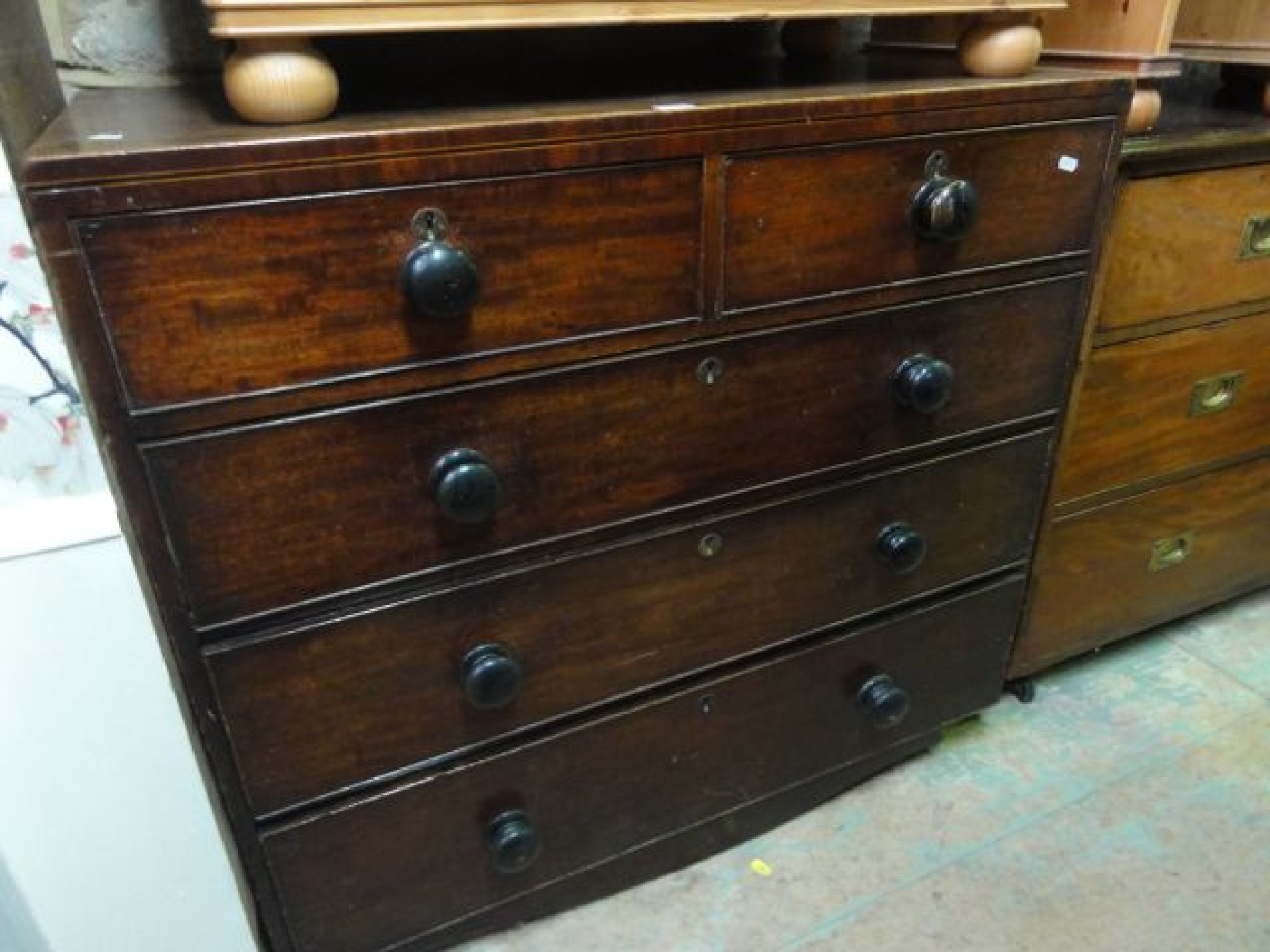 Appraisal: A th century mahogany caddy top chest of three long