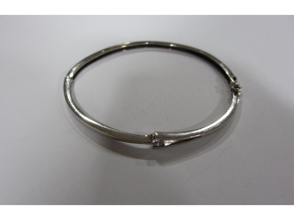 Appraisal: Eighteen carat white gold diamond set bangle