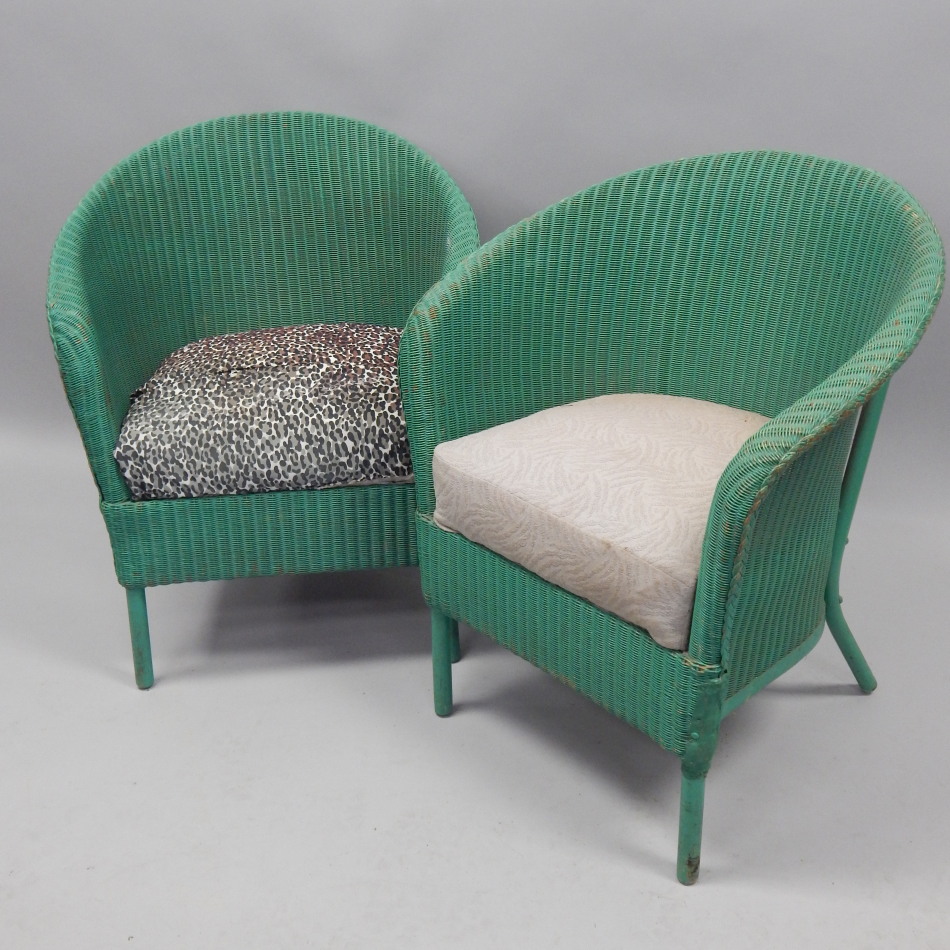 Appraisal: A green painted Lloyd Loom tub chair with a sprung