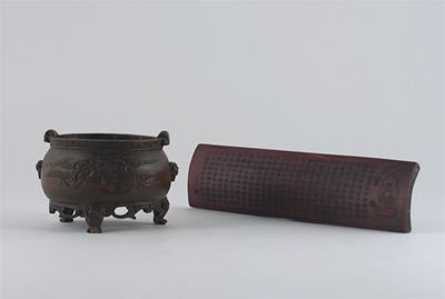 Appraisal: A Chinese carved bamboo tripod censer decorated with a dragon