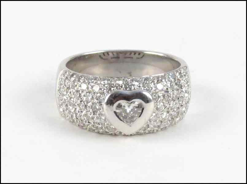 Appraisal: DIAMOND AND KARAT WHITE GOLD RING Central heart shaped diamond