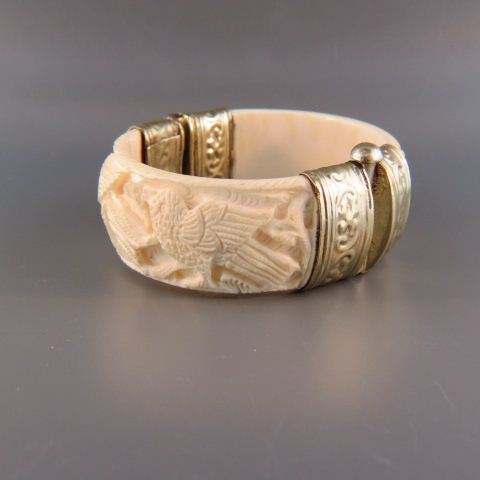 Appraisal: Carved Ivory Bracelet bird decor wide