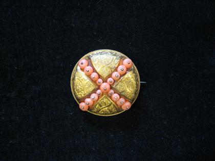 Appraisal: Yellow gold and coral memorial brooch Highly etched yellow gold