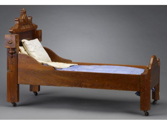 Appraisal: Walnut Victorian Doll-Size Bed America late th century Renaissance revival