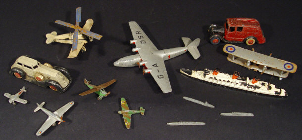 Appraisal: Collection of military Dinky toy planes American Diecast saloon Diecast