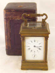 Appraisal: A quarter repeating Grande Sonnerie alarm carriage clock with Corinthian