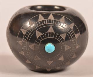 Appraisal: Pueblo Indian Carved Blackware Miniature Jar Turquoise inlay signed Red