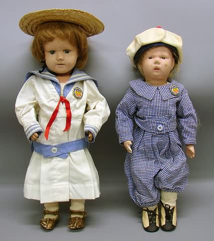 Appraisal: Pair of matching celluloid boy dolls and have the Turtle