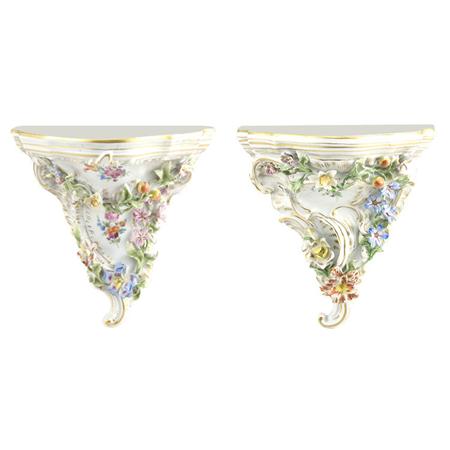 Appraisal: Pair of Dresden Gilt Decorated Porcelain Graduated Brackets Estimate -