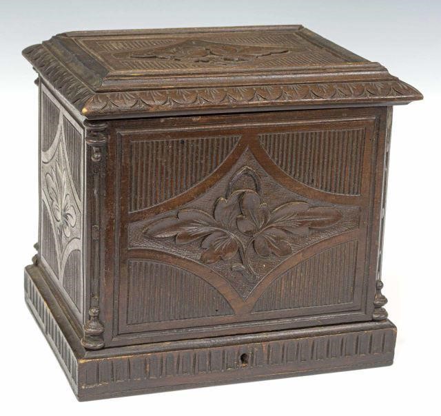 Appraisal: Black Forest style cave a liqueur box having carved walnut