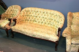 Appraisal: A Victorian mahogany and upholstered lounge suite including armchairs