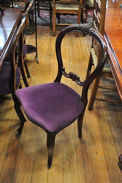 Appraisal: A SET OF SIX VICTORIAN DINING CHAIRS IN PURPLE UPHOLSTERY