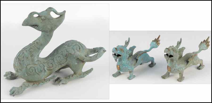 Appraisal: PAIR OF PATINATED METAL DRAGONS Together with a larger patinated