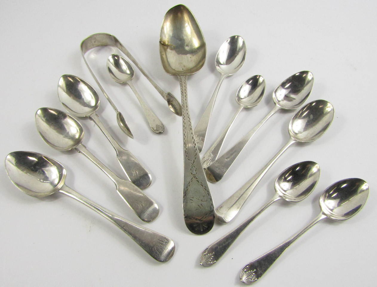 Appraisal: A Georgian silver tablespoon with bright cut engraving pair of