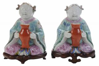 Appraisal: Pair Porcelain Girls Holding Vases Chinese th century each seated