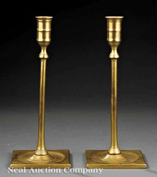 Appraisal: A Pair of Antique English Cast Brass Square Base Candlesticks