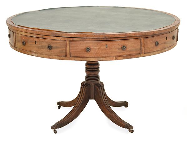 Appraisal: A TH CENTURY MAHOGANY DRUM TABLE ON FOUR SCROLL LEGSCIRCA