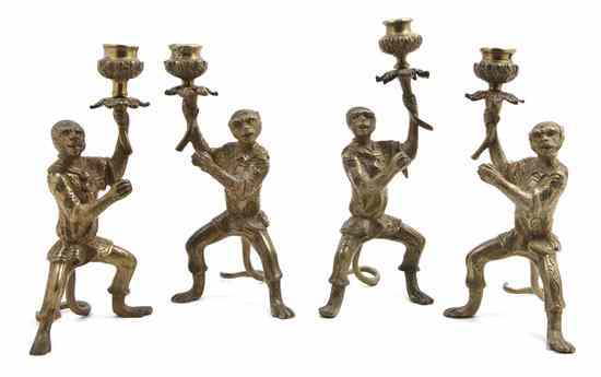 Appraisal: A Set of Four Continental Gilt Bronze Figural Candlesticks each