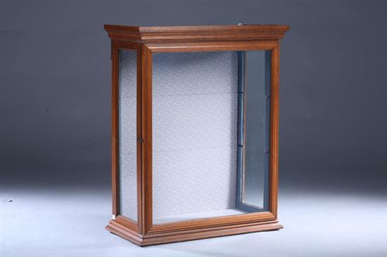 Appraisal: MIXED-WOOD HANGING VITRINE th Century Molded crown over hinged glazed-panel