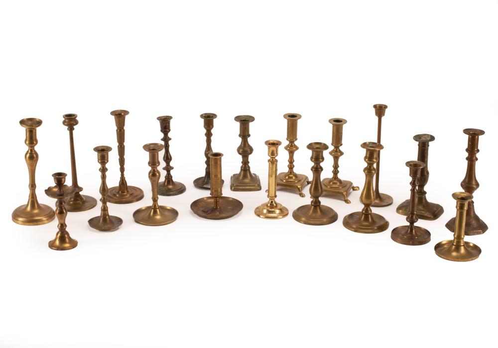 Appraisal: Twenty Continental Brass Candlesticks various forms tallest h in dia