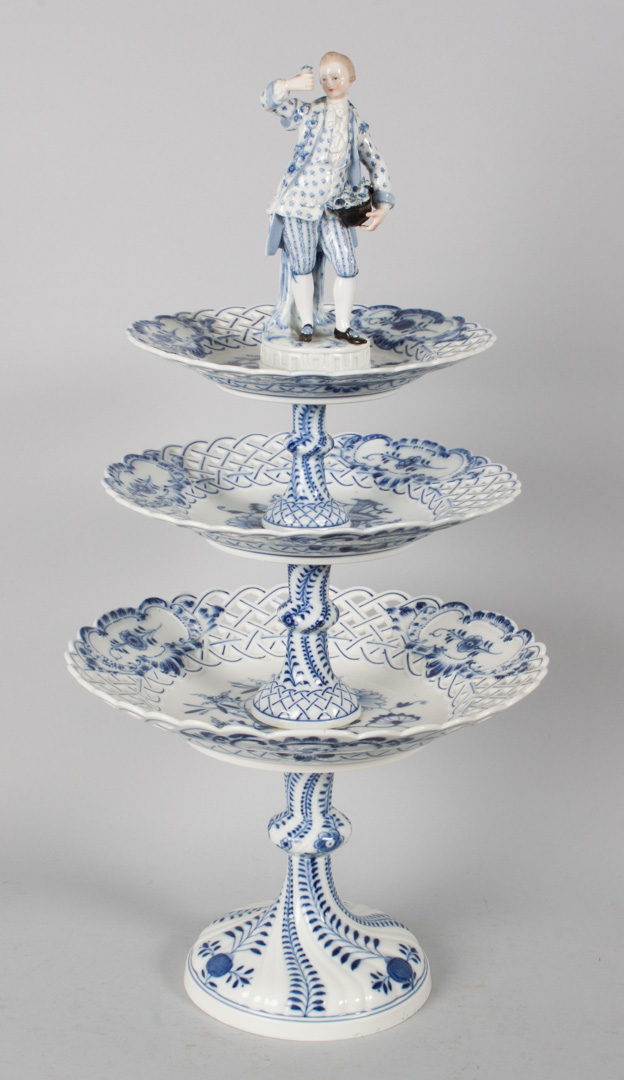 Appraisal: Meissen porcelain figural tazza th century assembled three-tier graduated reticulated