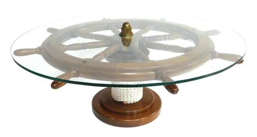 Appraisal: Ships wheel table with rope wrapped pedestal and fitted glass