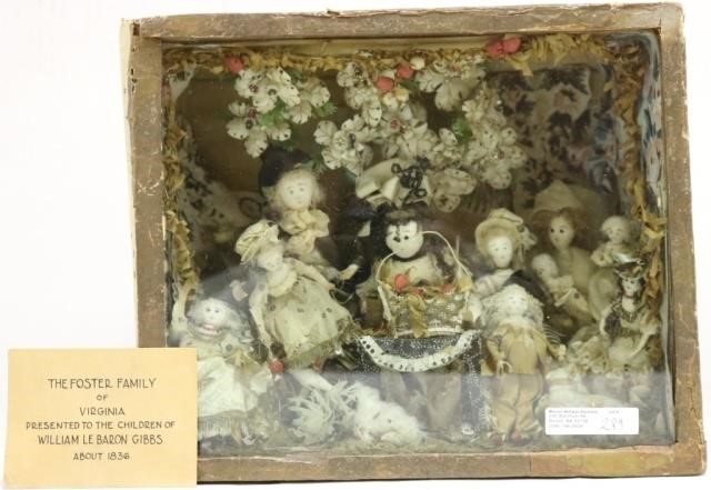 Appraisal: TH C SHADOWBOX WITH MINIATURE DOLLS DEPICTINGWOMAN WITH CHILDREN SHOWS