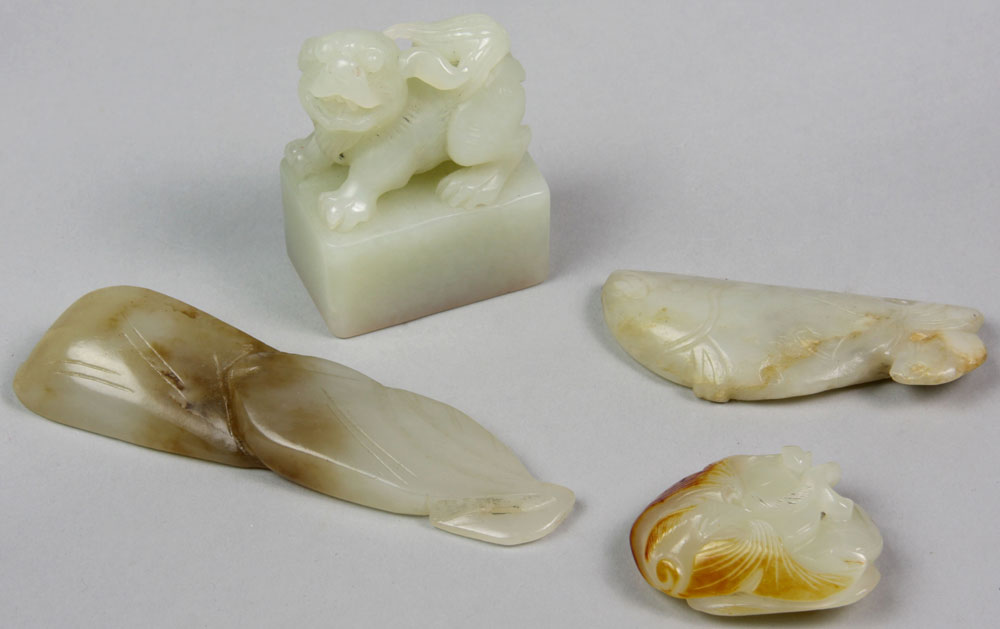 Appraisal: - Four White Jade Carved Miniature Figures Four white jade