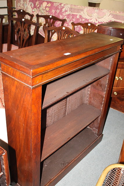 Appraisal: A VICTORIAN MAHOGANY OPEN BOOKCASE with two adjustable shelves on