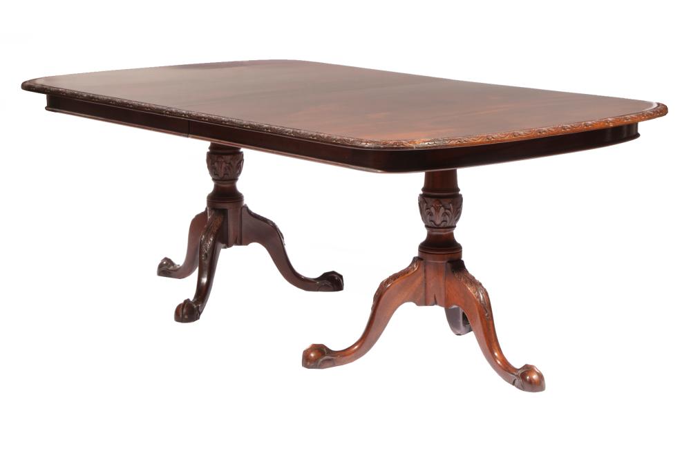 Appraisal: Georgian-Style Mahogany Two Pedestal Dining Table top with foliate-carved edge