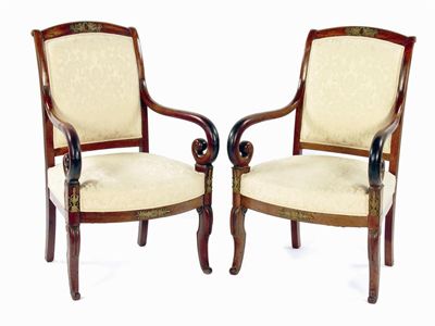 Appraisal: A pair of early th century French mahogany open armchairs