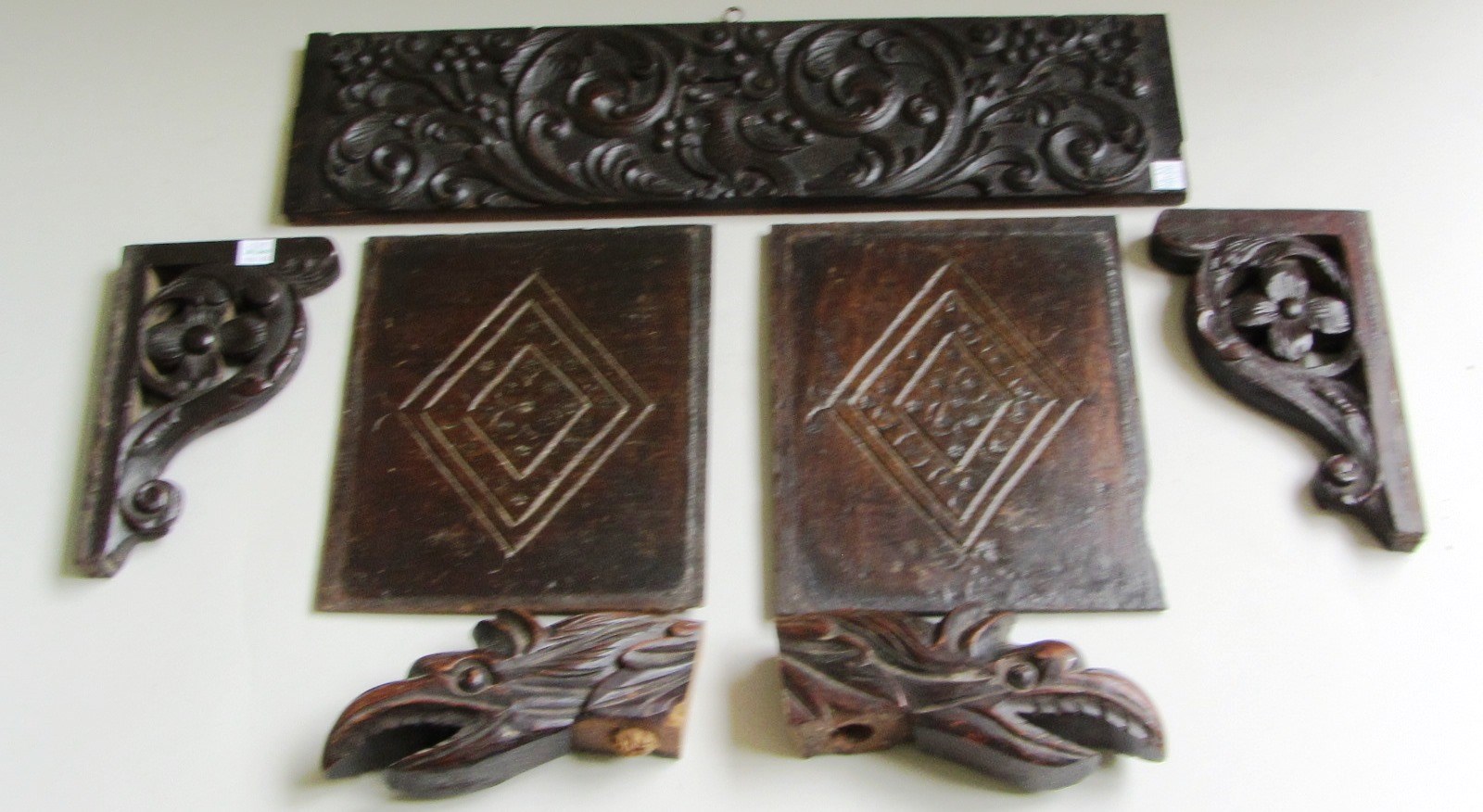 Appraisal: A pair of th century rectangular carved oak panels x