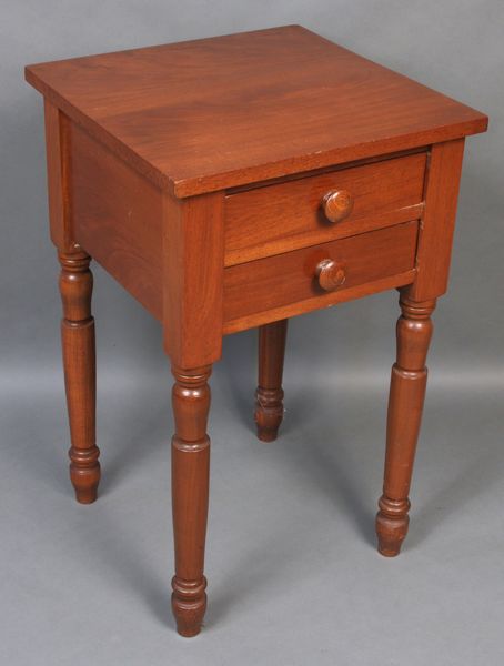 Appraisal: Early th Century Sheraton mahogany two-drawer stand h x w