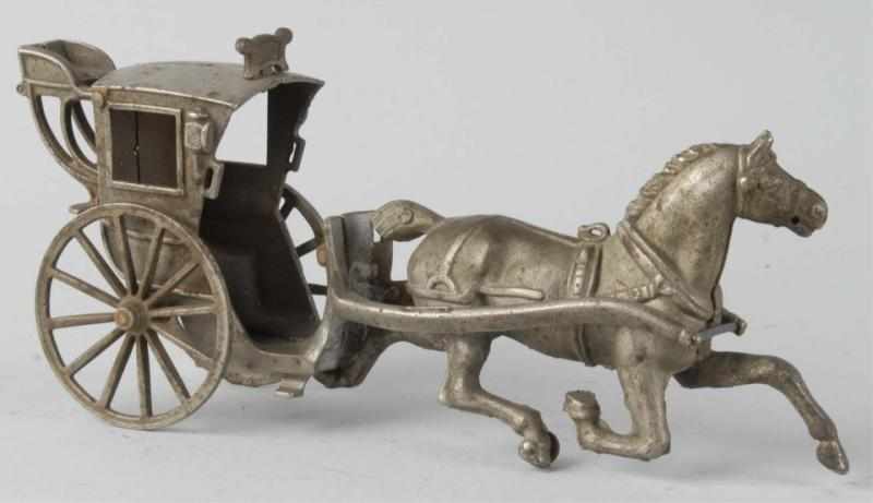 Appraisal: Cast Iron Nickel-Plates Hansom Cab Toy Description American Possibly made