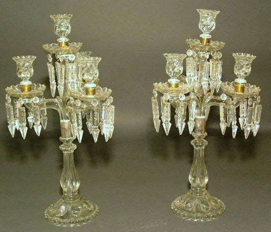 Appraisal: Pair of pressed glass candelabra with drop prisms h x