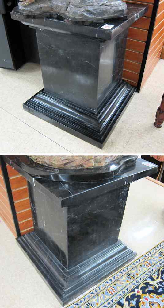 Appraisal: A PAIR OF SQUARE BLACK MARQUINA MARBLE PEDESTALS having a