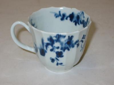 Appraisal: A FIRST PERIOD WORCESTER PORCELAIN COFFEE CUP of fluted form